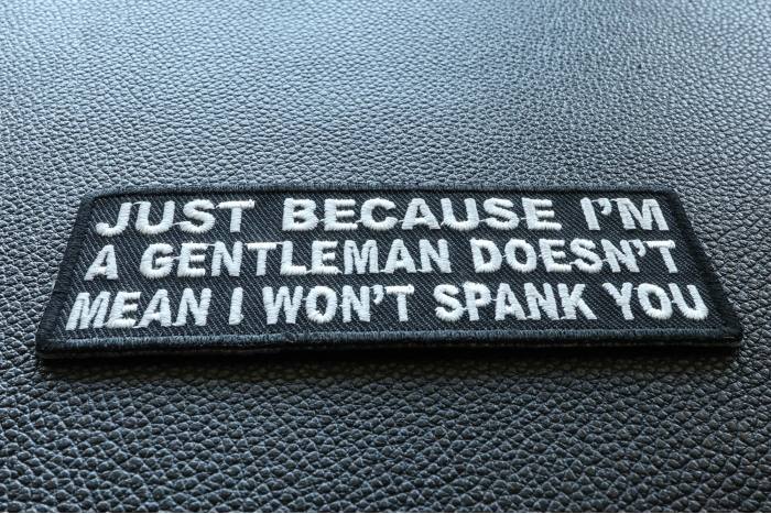 Just Because I'm A Gentleman Doesn't Mean I Won't Spank You Funny Iron on Patch diagonal view