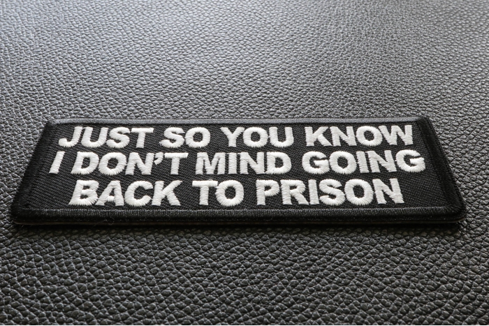 Just So You Know I don't Mind Going Back to Prison Funny Iron on Patch diagonal view