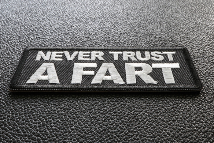 Never Trust a Fart Funny Iron on Patch diagonal view