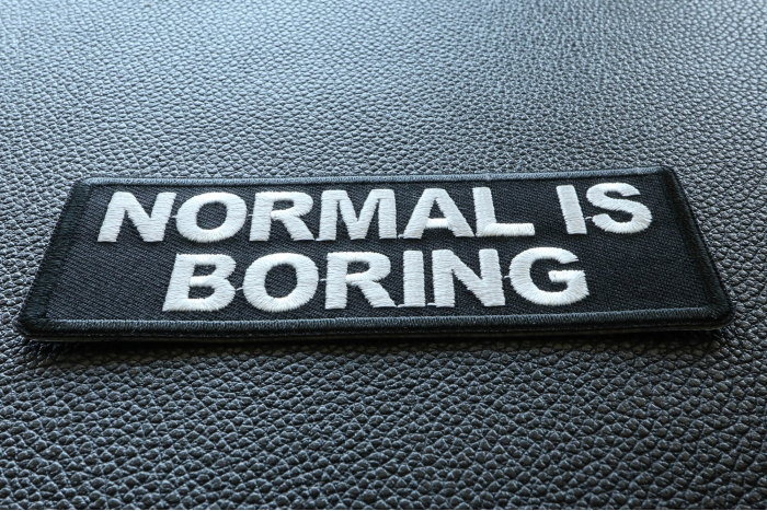 Normal is Boring Funny Iron on Patch diagonal view