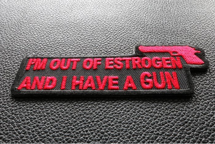 I'm Out Of Estrogen and I Have A Gun Funny Iron on Patch diagonal view