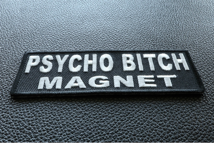 Psycho Bitch Magnet Funny Iron on Patch diagonal view