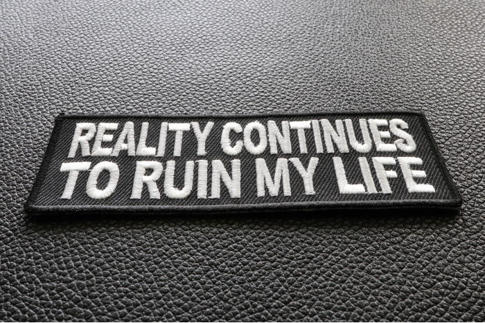 Reality Continues To Ruin My Life Funny Iron on Patch diagonal view