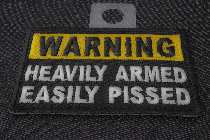 Warning Heavily Armed Easily Pissed Funny Iron on Patch diagonal view