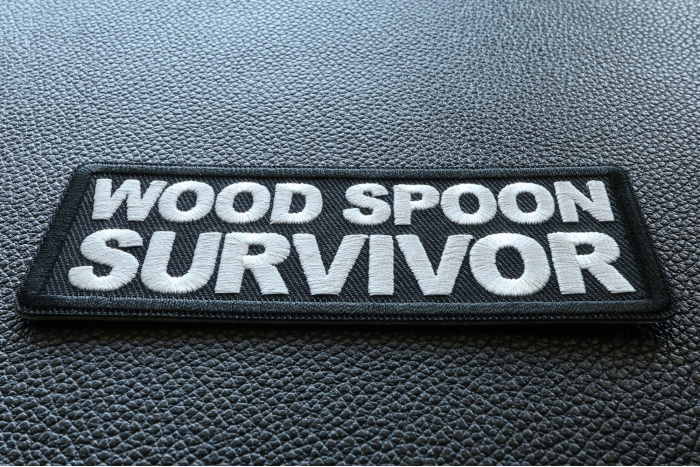Wood Spoon Survivor Funny Iron on Patch diagonal view