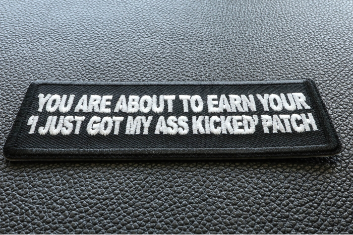 You are About to earn your I just got my Ass Kicked Funny Iron on Patch diagonal view