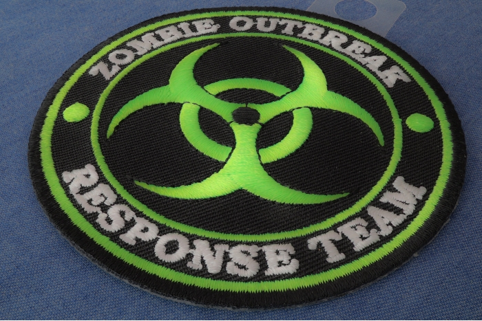 Zombie OutBreak Response Team Green Funny Iron on Patch diagonal view