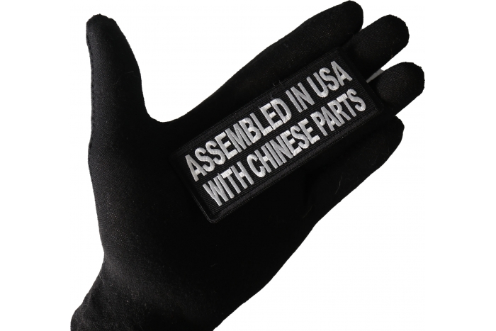 Assembled in USA with Chinese Parts Funny Iron on Patch shown on hand for size comparison