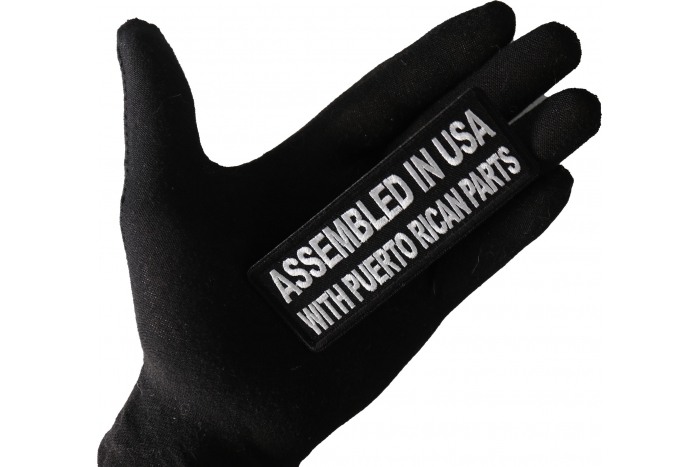 Assembled in USA with Puerto Rican Parts Funny Iron on Patch shown on hand for size comparison