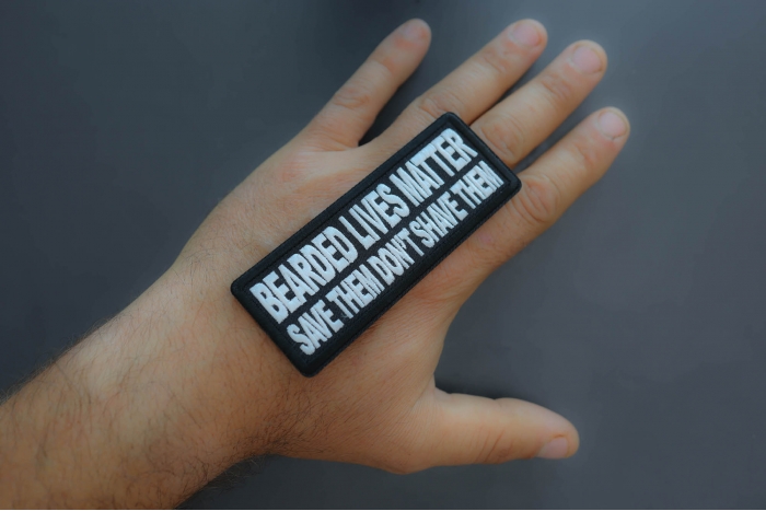 Bearded Lives Matter Save them Don't Shave them Patch shown on hand for size comparison