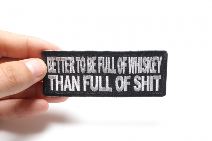 Better To Be Full Of Whiskey Than Full of Shit Funny Iron on Patch shown on hand for size comparison