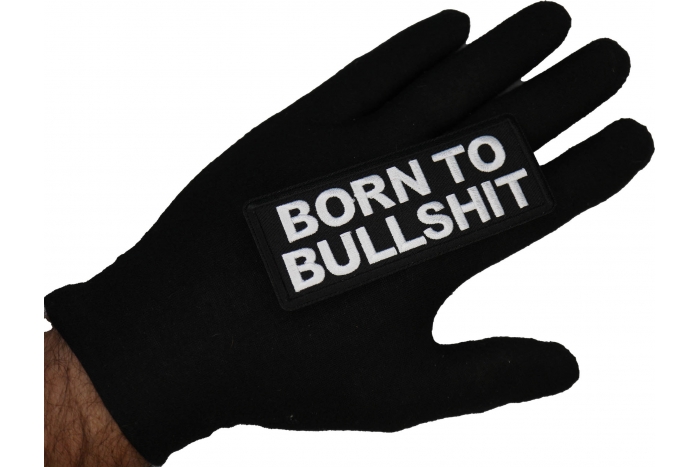 Born to Bullshit Patch shown on hand for size comparison