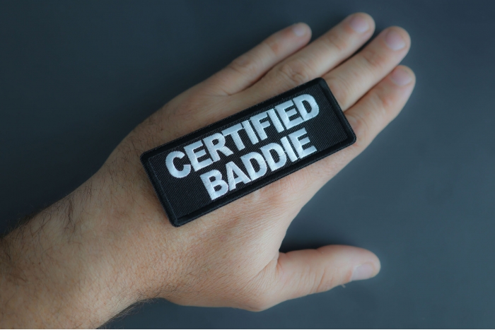 Certified Baddie Patch shown on hand for size comparison
