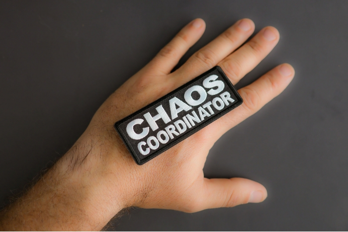 Chaos Coordinator Patch shown on hand for size comparison