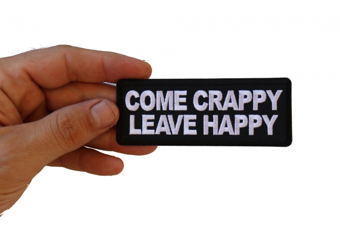 Come Crappy Leave Happy Funny Iron on Patch shown on hand for size comparison