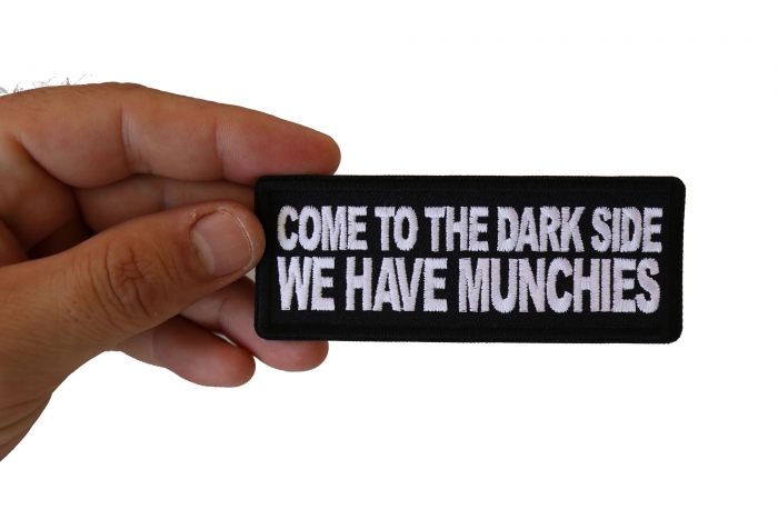 Come to the Dark Side We Have Munchies Funny Iron on Patch shown on hand for size comparison