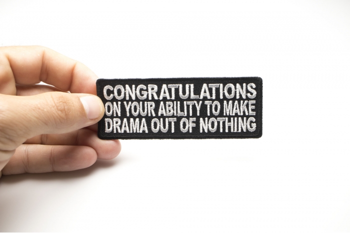 Congratulations On Your Ability To Make Drama Out Of Nothing Funny Iron on Patch shown on hand for size comparison