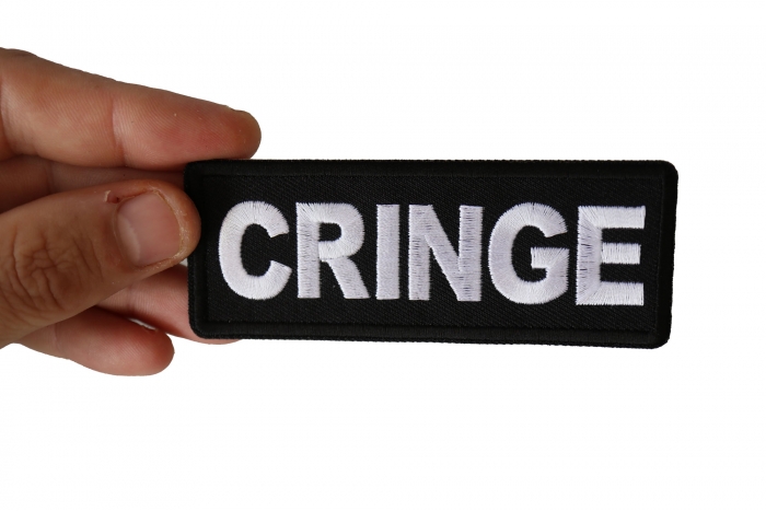 Cringe Funny Iron on Patch shown on hand for size comparison