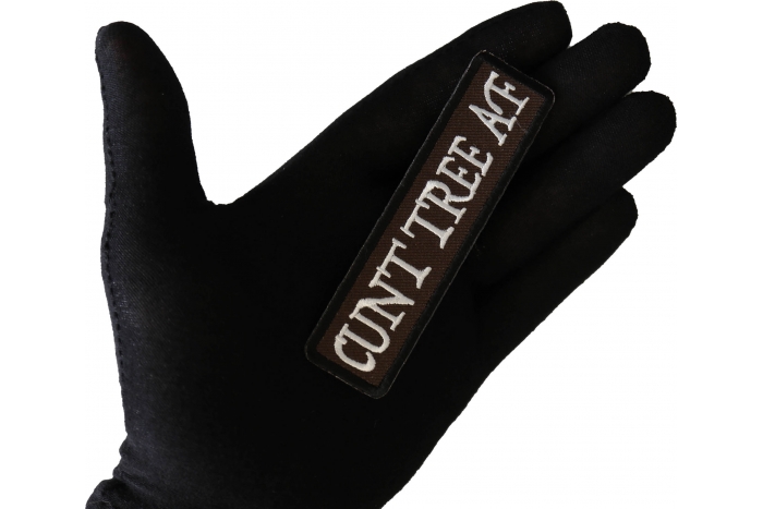 Cunt Tree AF Funny Iron on Patch shown on hand for size comparison