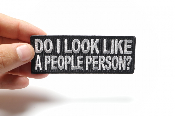 Do I Look Like A People Person Funny Iron on Patch shown on hand for size comparison