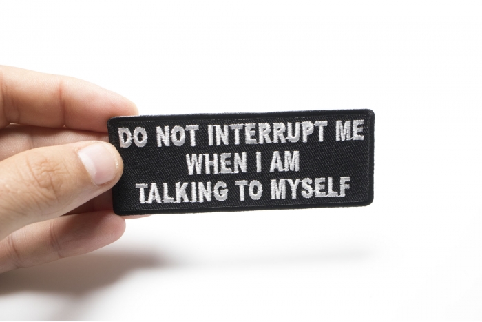 Do Not Interrupt Me When I Am Talking To Myself Patch, Funny Saying Patches shown on hand for size comparison