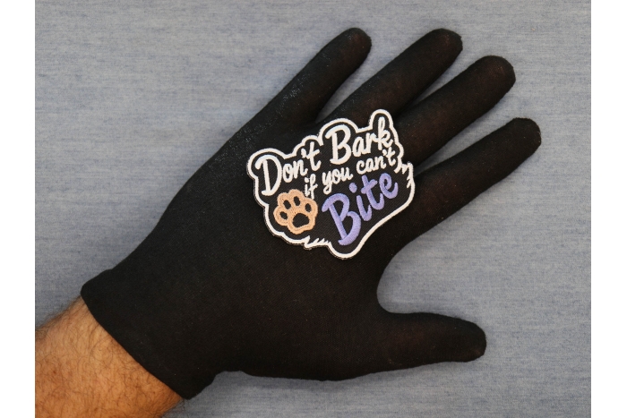 Don't Bark if you can't Bite Patch shown on hand for size comparison
