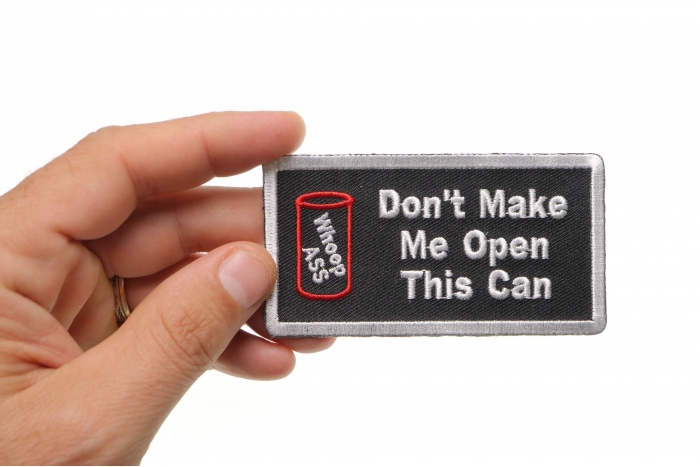 Don't Make Me Open This Can Funny Iron on Patch shown on hand for size comparison