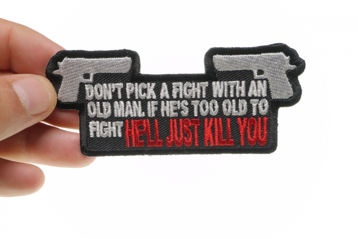 Don't Pick A Fight With An Old Man If He's Too Old to Fight He'll Just Kill You Patch, Biker Sayings shown on hand for size comparison