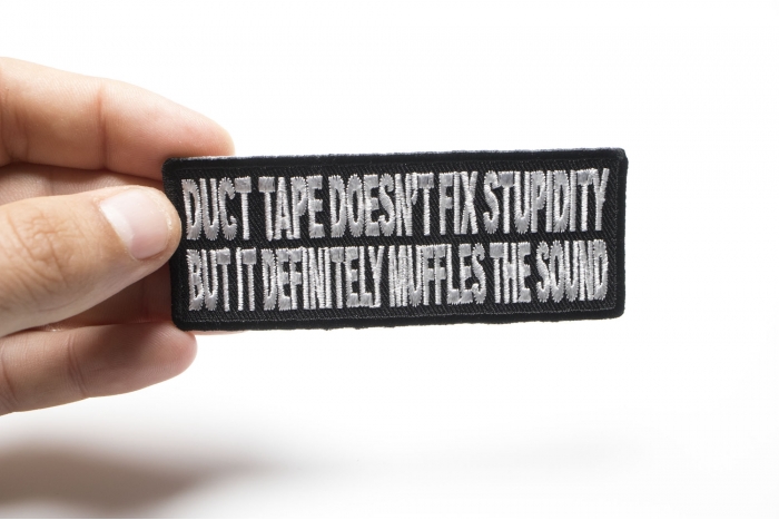 Duct Tape Doesn't Fix Stupidity It Muffles The Sound Fun Funny Iron on Patch shown on hand for size comparison