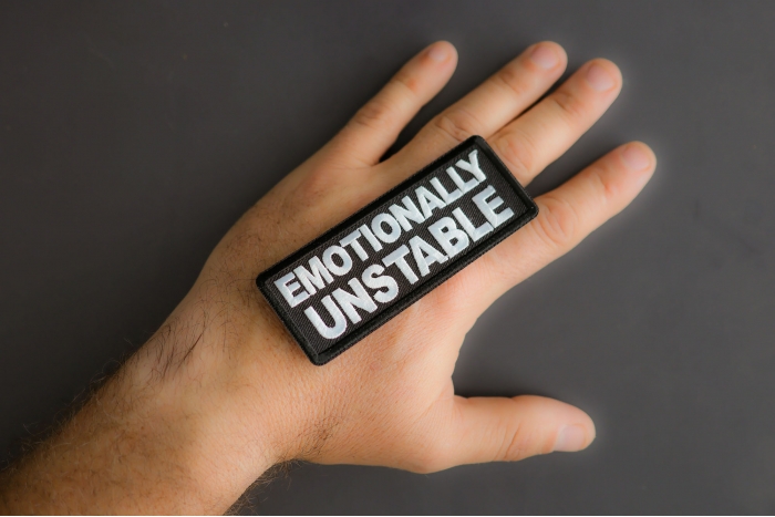 Emotionally Unstable Patch shown on hand for size comparison