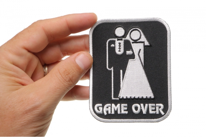 Game Over Marriage Funny Iron on Patch shown on hand for size comparison