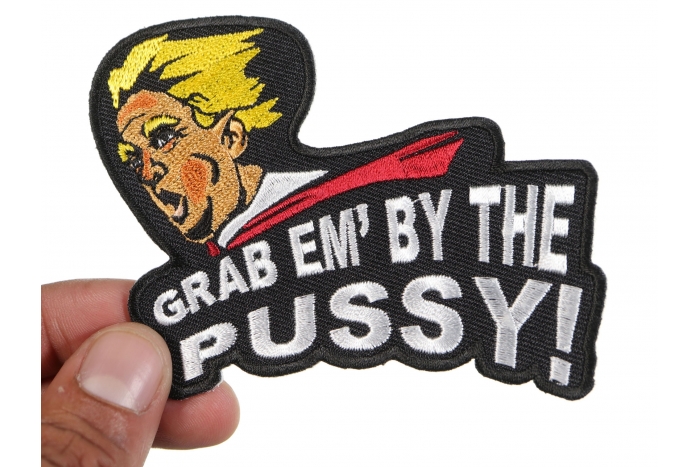 Grab Em By The Pussy Trump Funny Iron on Patch shown on hand for size comparison