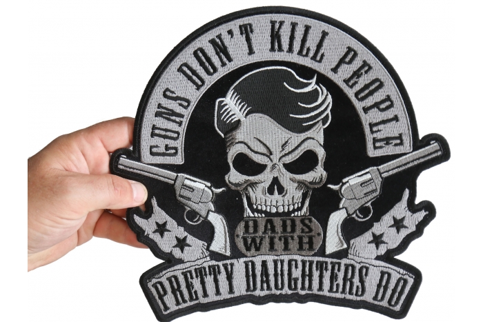 Guns don't kill People Dads with Pretty Daughters Do Skull and Pistols Patch, Large Back Patches for Vests shown on hand for size comparison