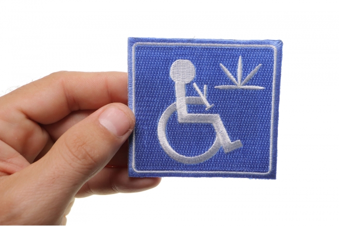 Handicap Stoner With Bong Iron on Funny Iron on Patch shown on hand for size comparison