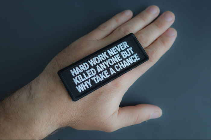 Hard Work Never Killed Anyone But Why Take A Chance Patch shown on hand for size comparison