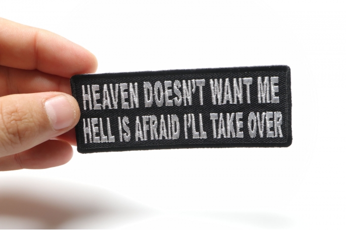 Heaven Doesn't Want Me Hell Is Afraid I'll Take Over Funny Iron on Patch shown on hand for size comparison