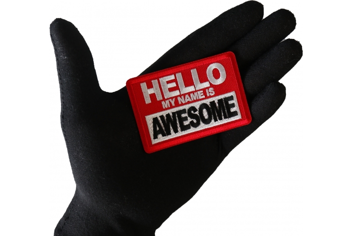 Hello My Name is Awesome Funny Iron on Patch shown on hand for size comparison