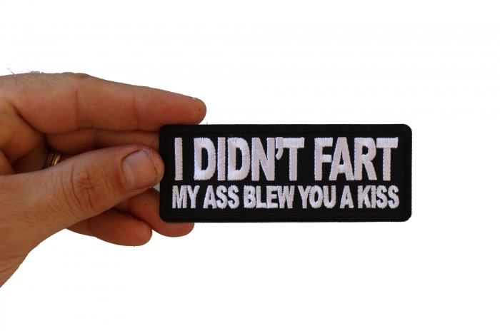 I didn't Fart My Ass Blow you a Kiss Funny Iron on Patch shown on hand for size comparison