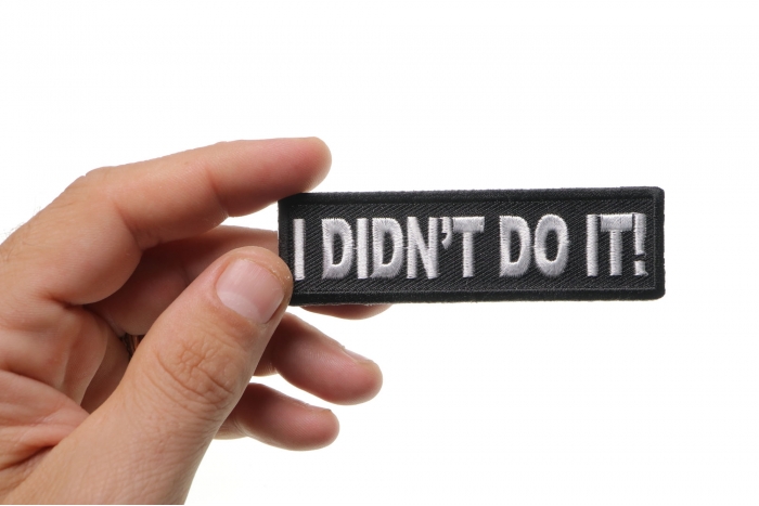 I Didn't Do It Funny Iron on Patch shown on hand for size comparison