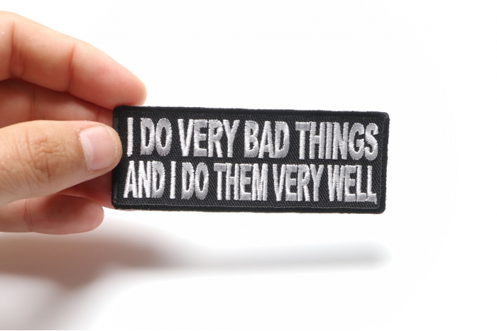 I Do Very Bad Things and I Do Them Very Well Funny Patch shown on hand for size comparison