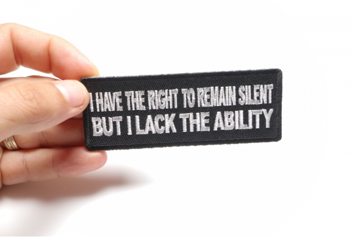 I have the Right to Remain Silent But I lack the ability Funny Iron on Patch shown on hand for size comparison