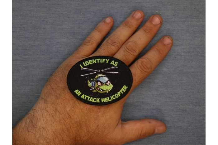 I identify as an attack Helicopter Patch shown on hand for size comparison