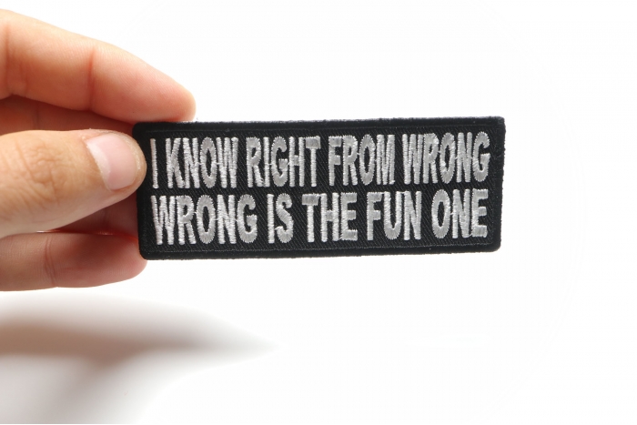 I Know Right From Wrong Wrong Is The Fun One Funny Iron on Patch shown on hand for size comparison