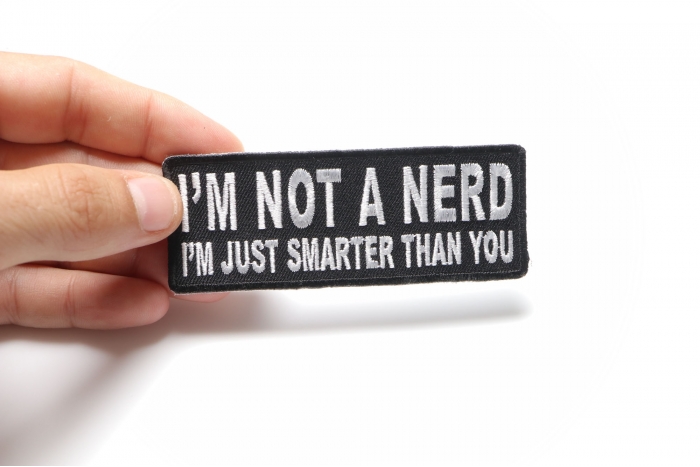 I'm Not A Nerd I'm Just Smarter Than You Funny Iron on Patch shown on hand for size comparison