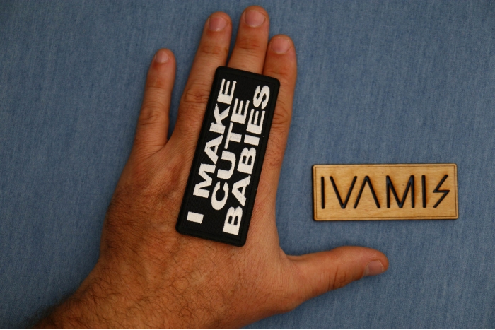 I Make Cute Babies Patch shown on hand for size comparison