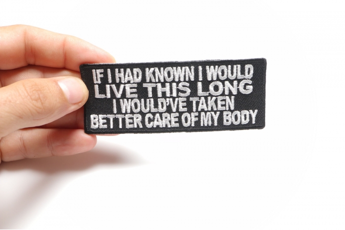 If I Had Known I Would Live This Long I Would've Taken Better Care Of My Body Funny Iron on Patch shown on hand for size comparison