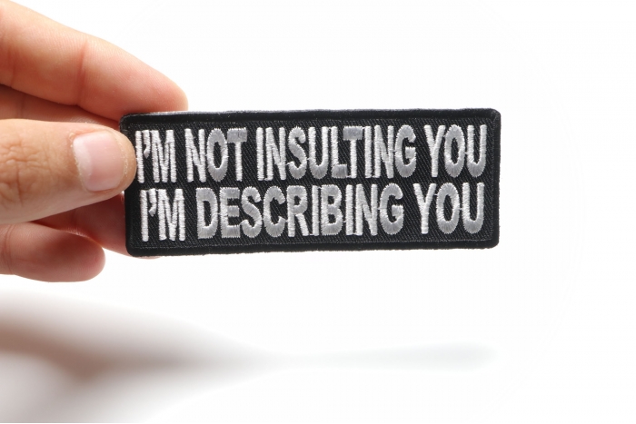 I'm Not Insulting You I'm Describing You Patch, Funny Saying Patches shown on hand for size comparison