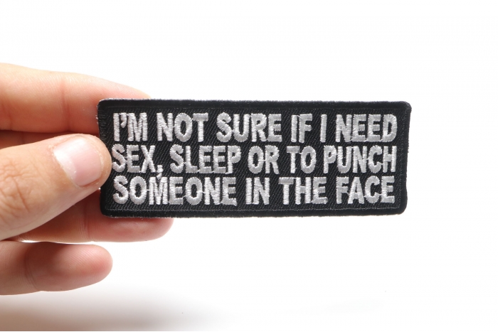 I'm Not Sure If I Need Sex Sleep or To Punch Someone In The Face Funny Iron on Patch shown on hand for size comparison