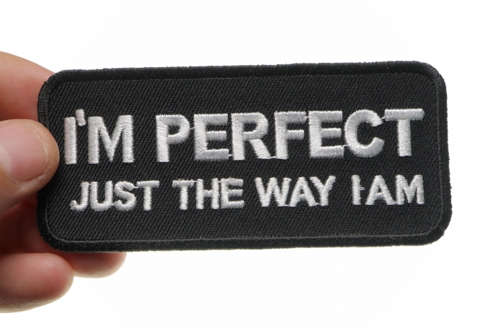 I'm Perfect Just The Way I Am Funny Iron on Patch shown on hand for size comparison