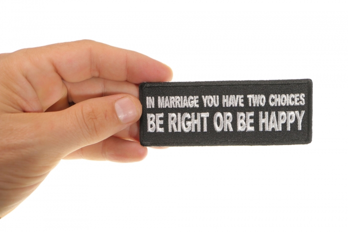 In Marriage you have two Choices Be Right or Be Happy Funny Iron on Patch shown on hand for size comparison